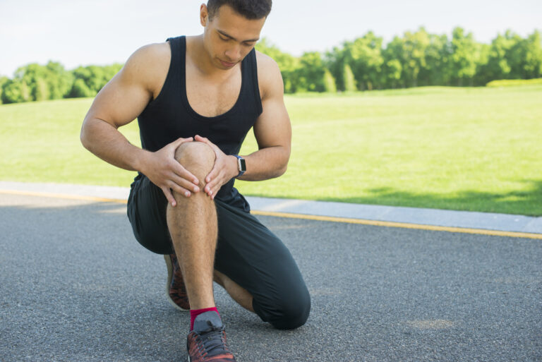 An athletic man showing tendinopathy
